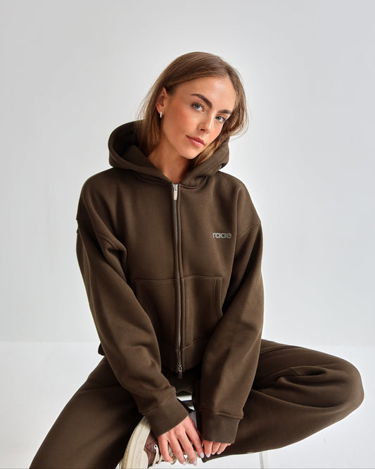 A Core Essential: Why Smokey Olive Works Year-Round